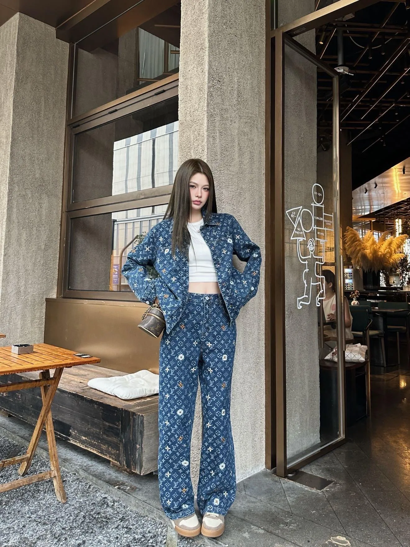 Louis Vuitton/Louis Vuitton all-over logo daisy embroidered jeans
